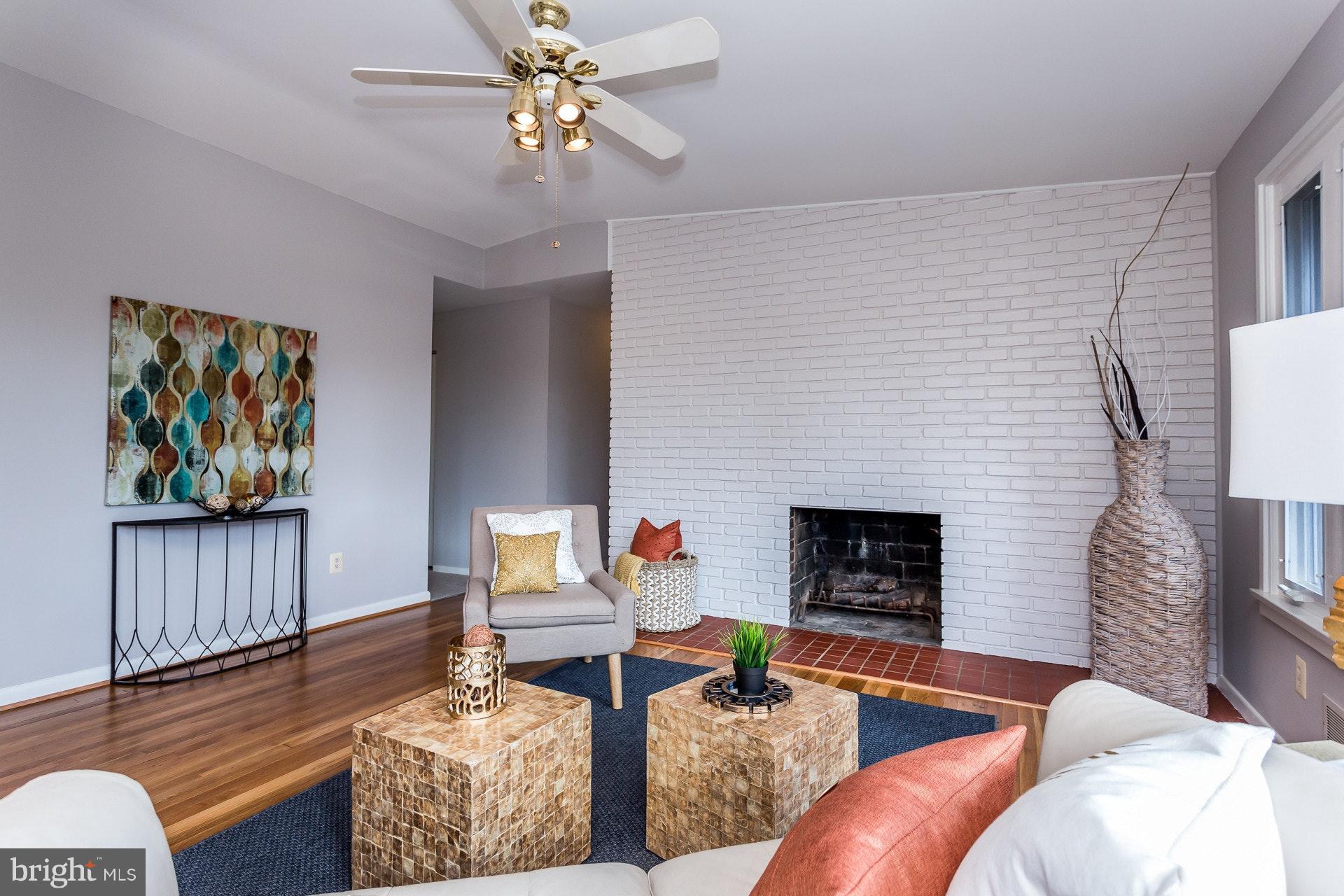 7204 Alger Road Falls Church, VA 22042 - Photo 6 of 30 Wood burning fireplace and brick accent wall