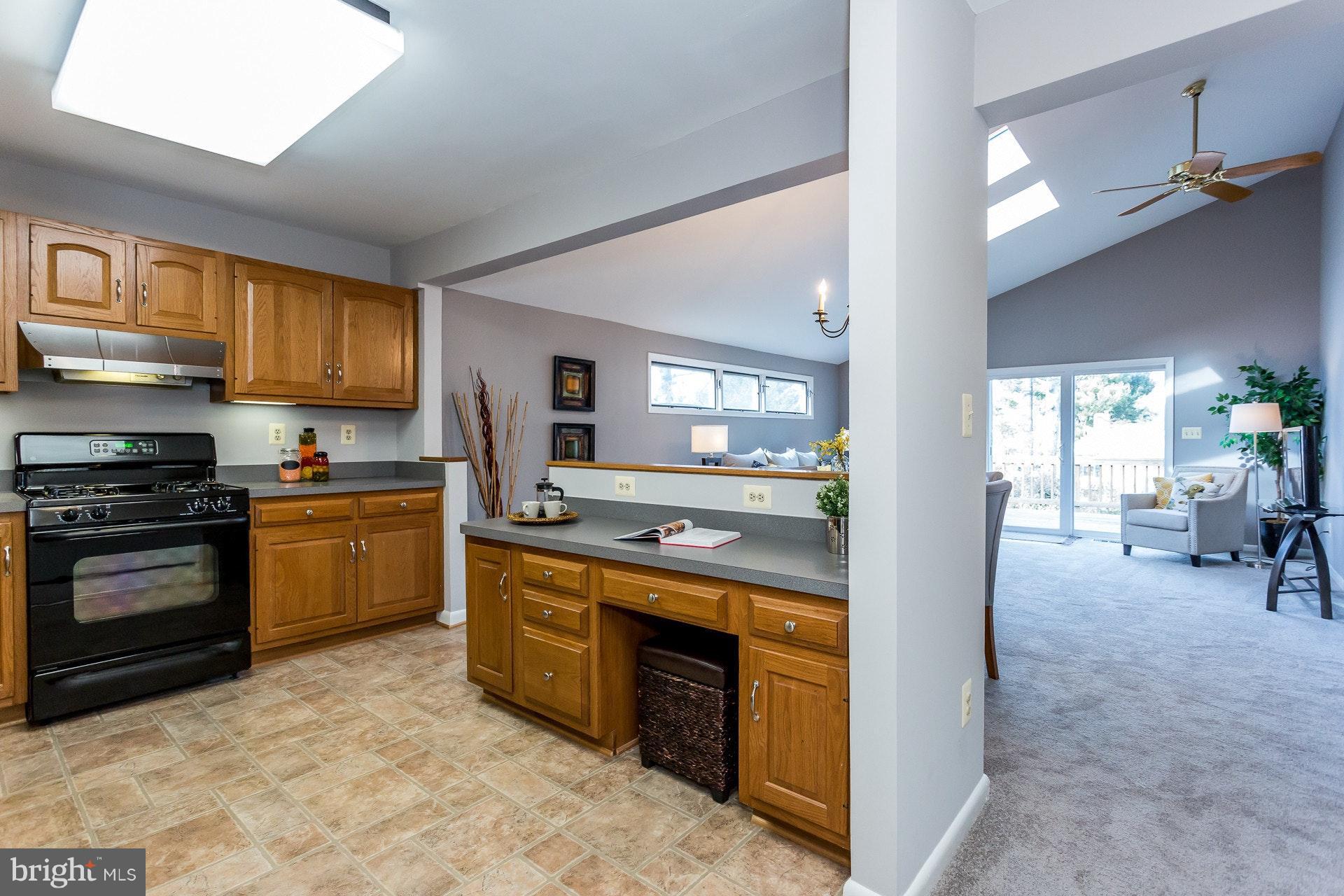 7204 Alger Road Falls Church, VA 22042 - Photo 8 of 30 Kitchen offers ample cabinet space and opens to FR