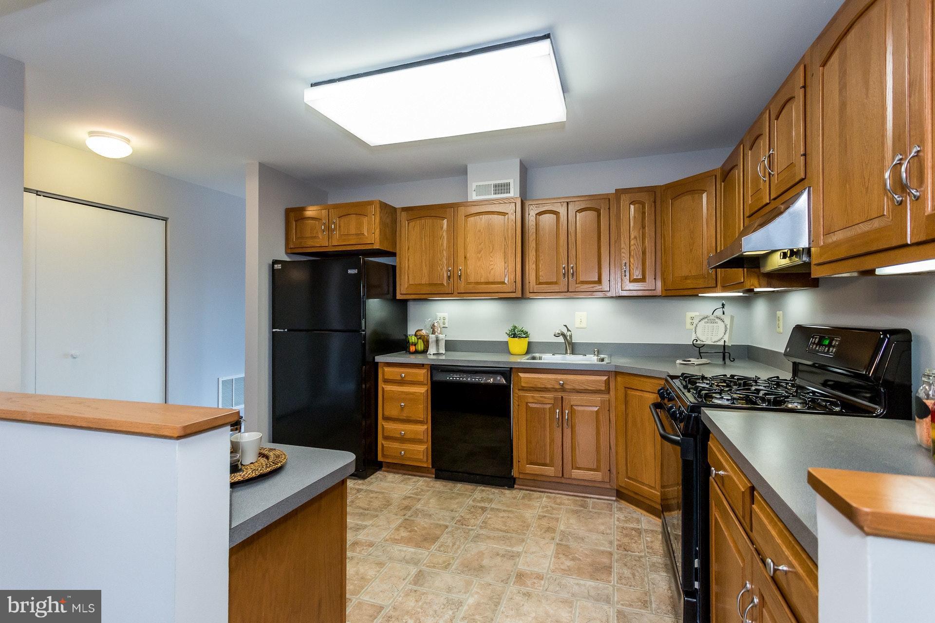 7204 Alger Road Falls Church, VA 22042 - Photo 9 of 30 Kitchen is spacious and great for entertaining