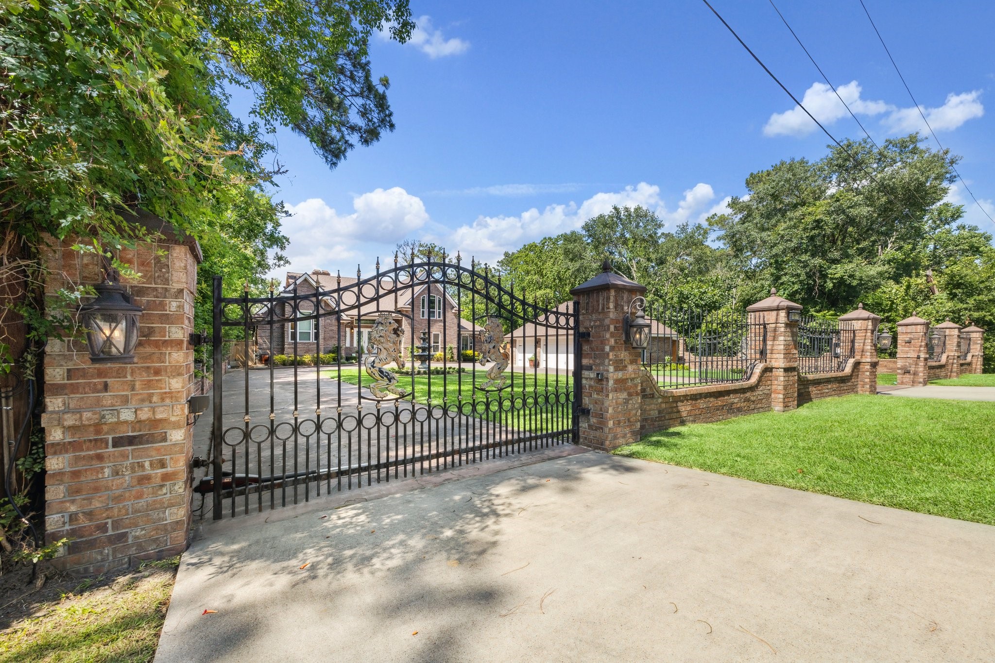 1917 Anchor Way Dickinson, TX 77539 - Photo 14 of 48 REMOTE GATE HAS ENTRY AND EXIT INTO THE CIRCULAR DRIVEWAY
