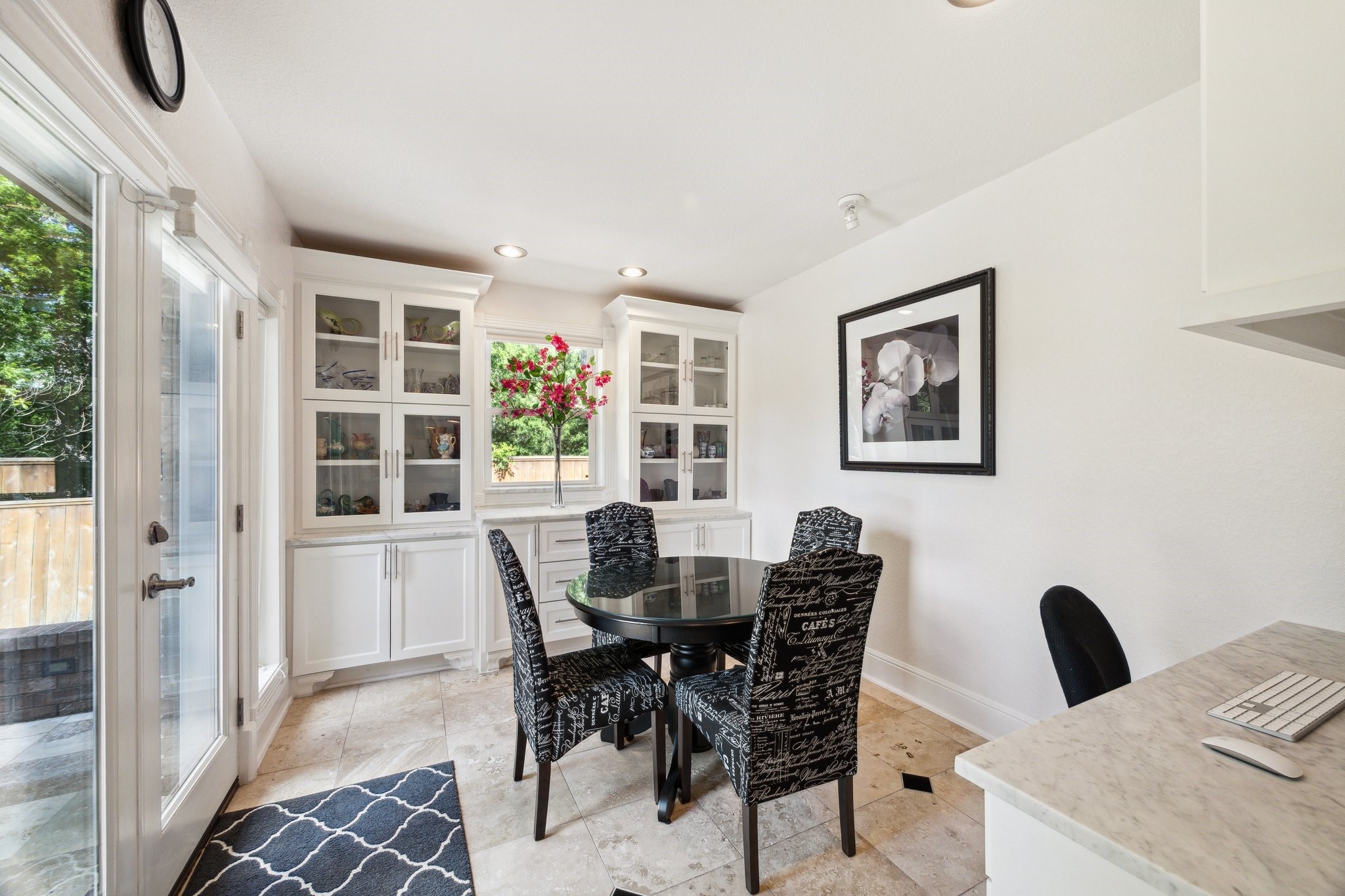 1917 Anchor Way Dickinson, TX 77539 - Photo 17 of 48 BREAKFAST ROOM HAS EXIT TO BACK PATIO, BUILT IN DESK AND CABINETS WITH CUSTOM MARBLE COUNTERTOPS