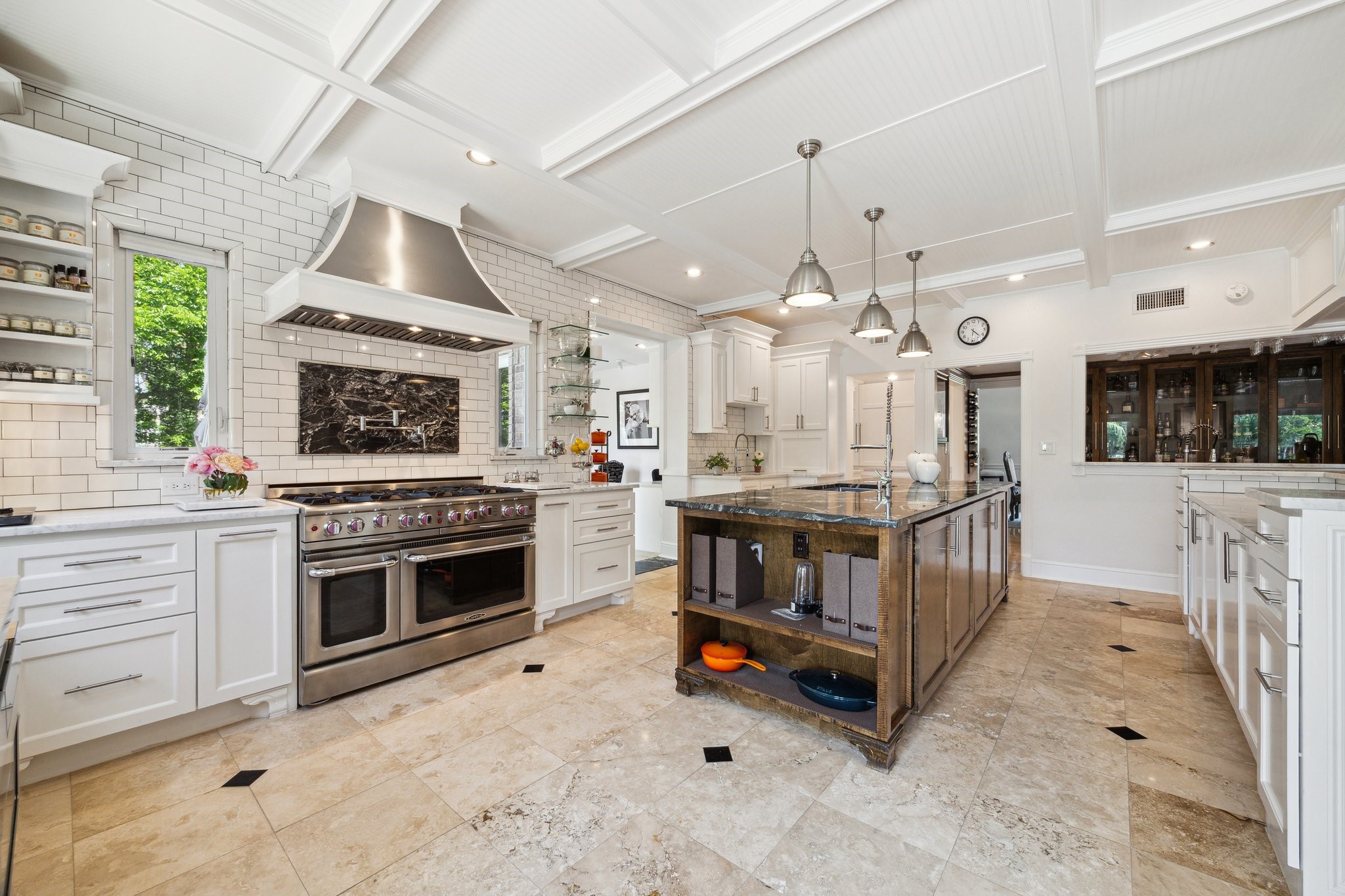 1917 Anchor Way Dickinson, TX 77539 - Photo 19 of 48 CHEF'S DREAM COOKING OVER THIS 8-BURNER, DOUBLE OVEN RANGE WHICH INCLUDES A POT FILLER OVER A MARBLE BACKSPLASH