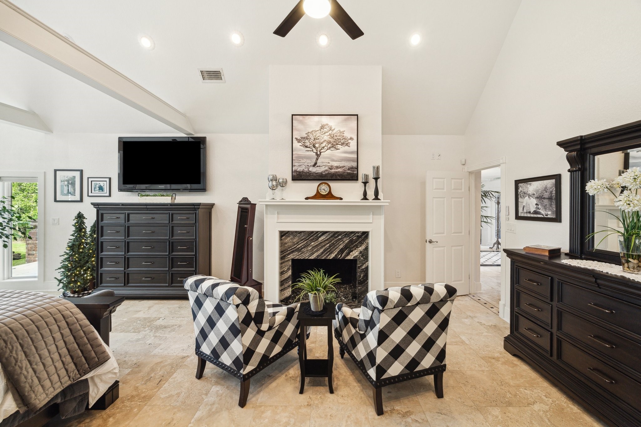 1917 Anchor Way Dickinson, TX 77539 - Photo 26 of 48 COZY UP WITH A GOOD BOOK IN FRONT OF THE GRANITE TRIMMED FIREPLACE IN THE PRIMARY BEDROOM