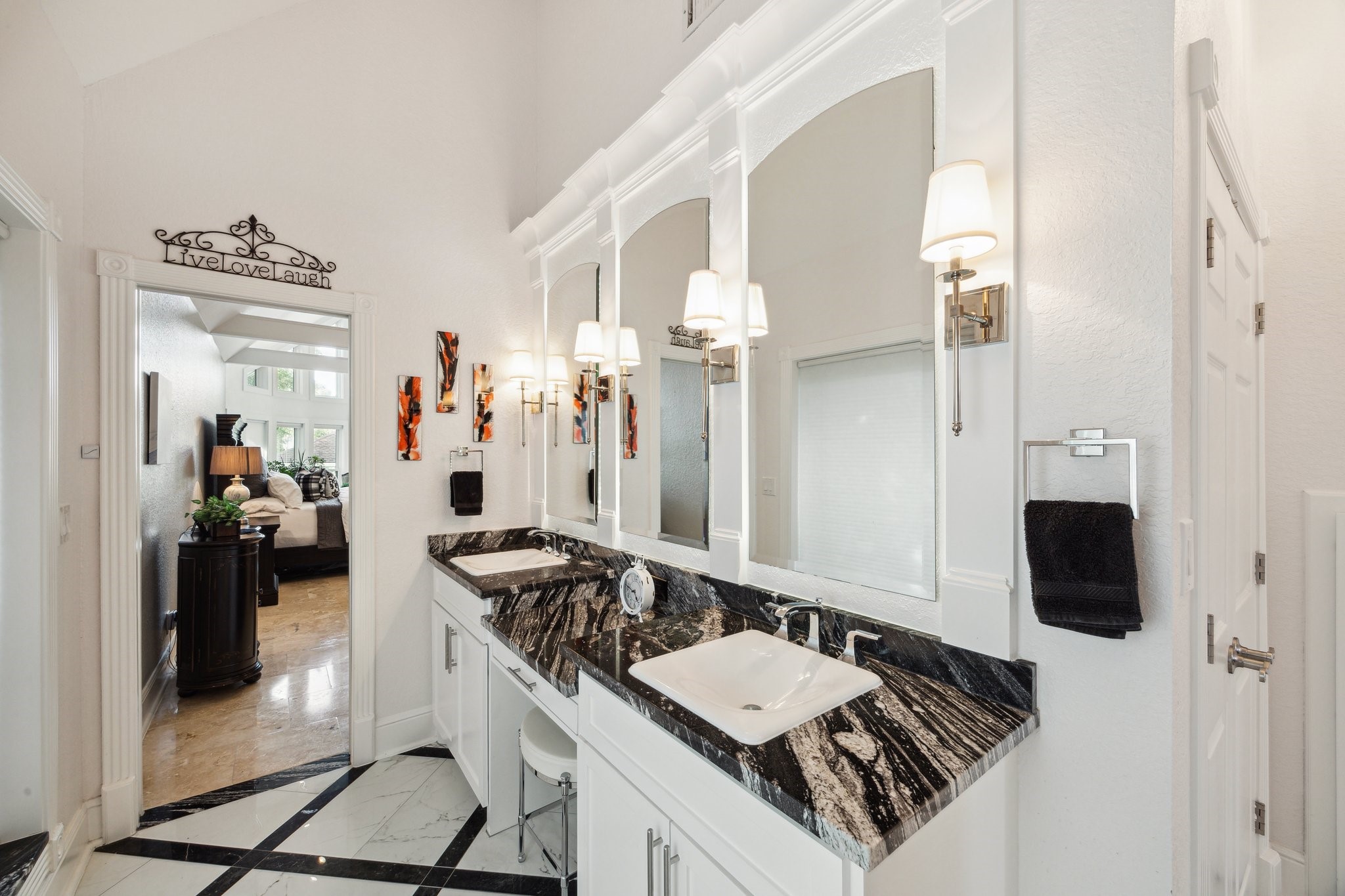 1917 Anchor Way Dickinson, TX 77539 - Photo 28 of 48 LOOK AT THIS STUNNING PRIMARY SUITE VANITY AND CUSTOM FLOORING!