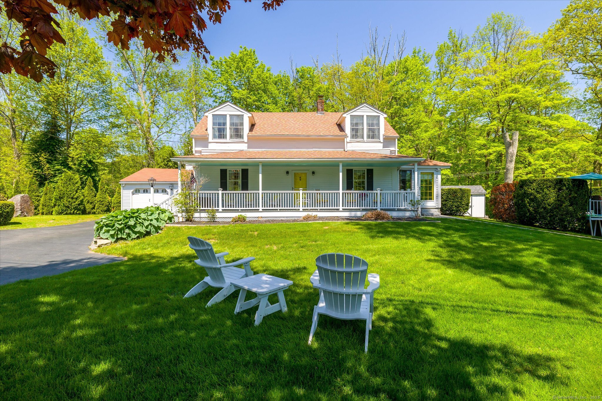 255 Killingly Road Pomfret, CT 06259 - Photo 1 of 1 a view of a house with a backyard patio and swimming pool