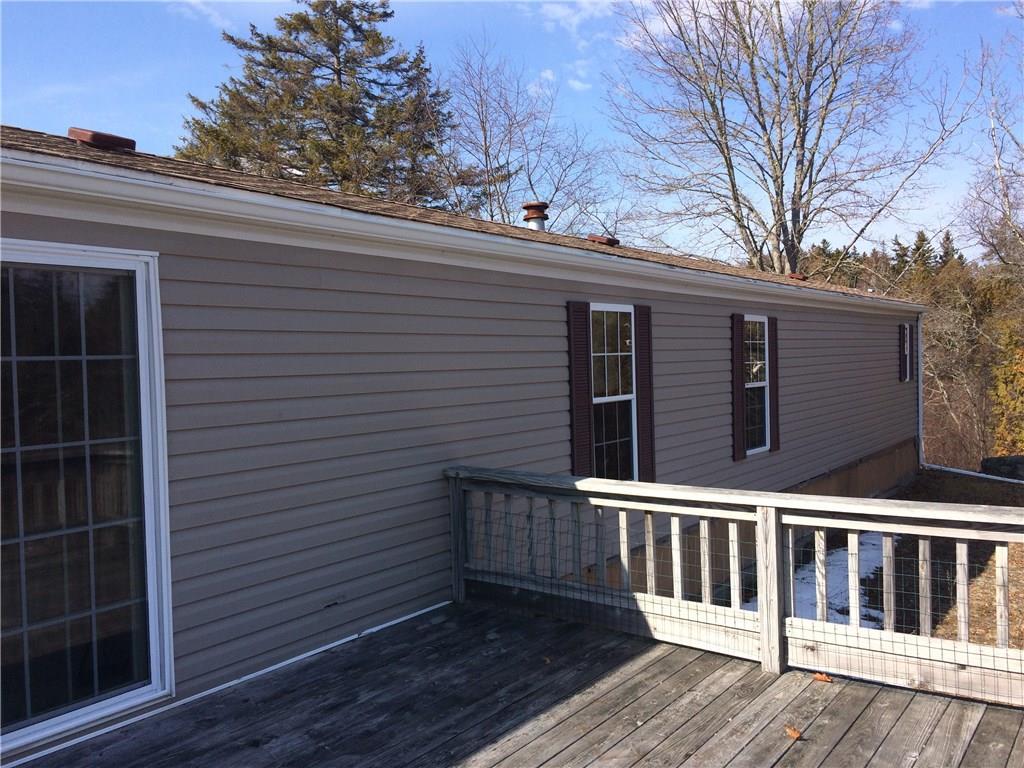 78 Cape Road Seal Cove, ME 04674 - Photo 5 of 24 Exterior back with sunny, open deck...