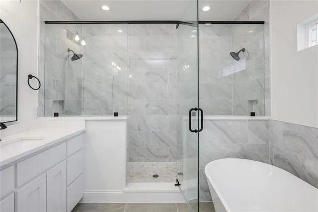 a bathroom with a sink and a shower