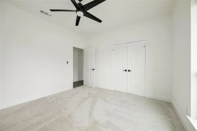 a view of a room with a hallway