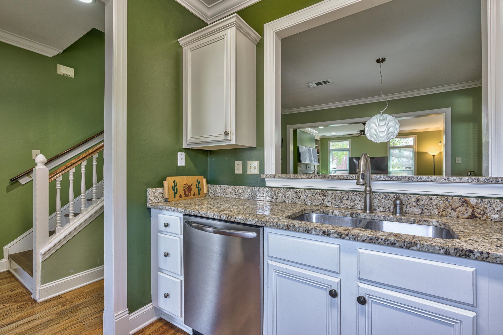 533 Rienzi Drive Memphis, TN 38103 - Photo 12 of 25 a bathroom with a granite countertop sink and a mirror