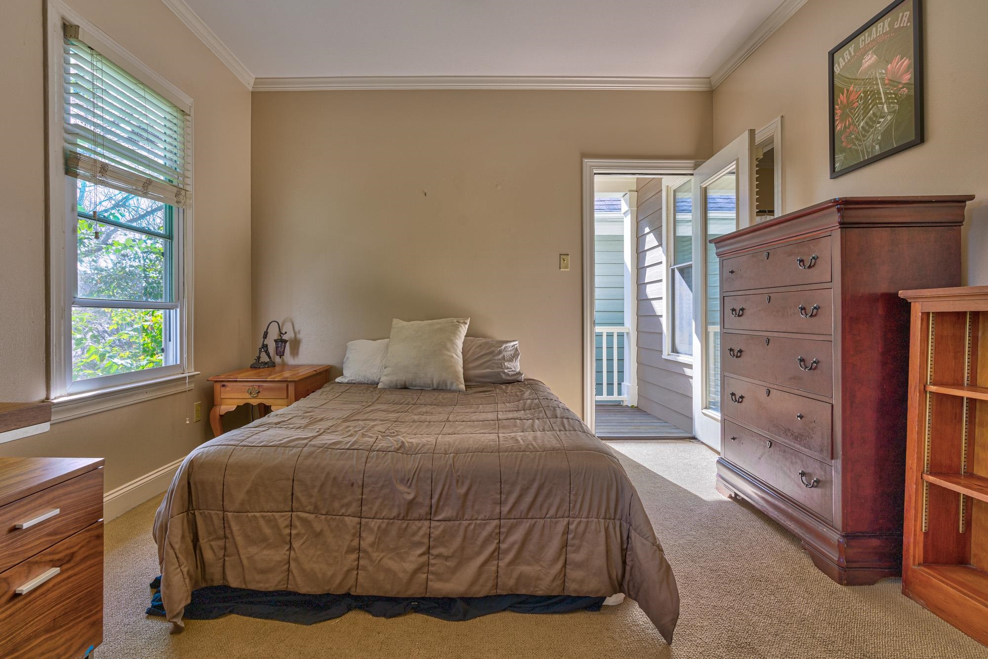 533 Rienzi Drive Memphis, TN 38103 - Photo 19 of 25 a bedroom with a bed and a dresser
