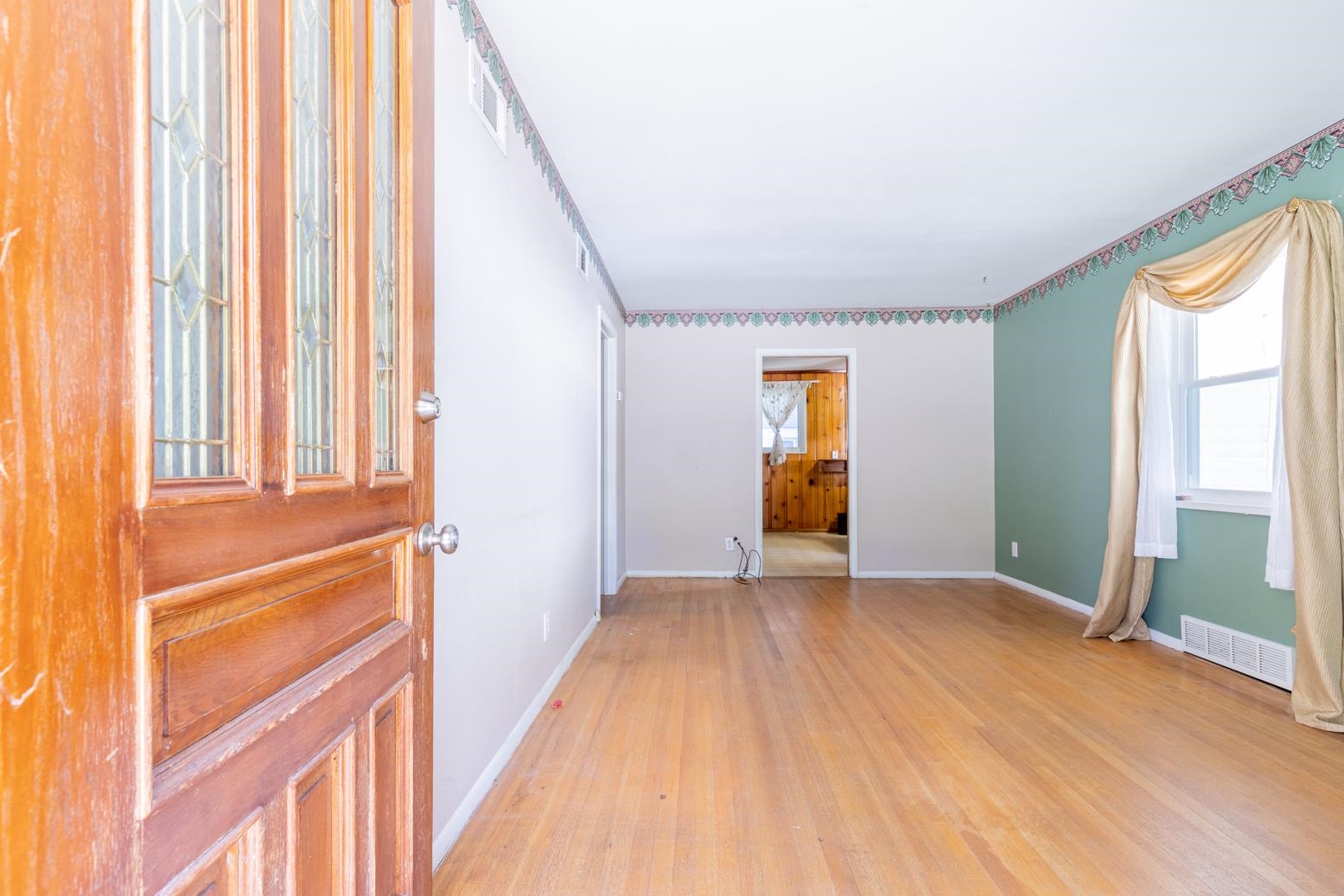 497 Fleda Road Memphis, TN 38120 - Photo 3 of 25 a view of an empty room with a window
