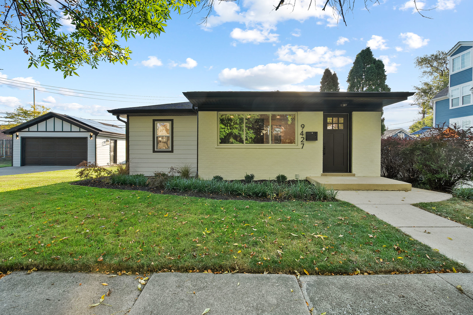 a front view of a house with garden