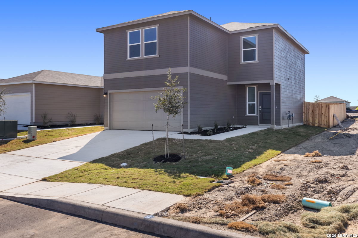 10030 Jagger Avenue Converse, TX 78109 - Photo 4 of 28 a view of a house with a yard