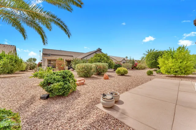a view of a backyard of the house