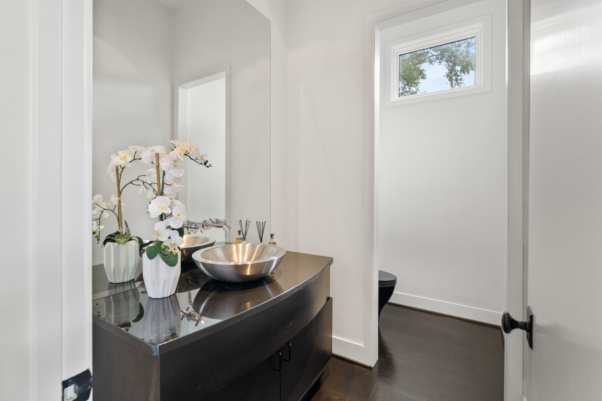 2409 Maconda Lane Houston, TX 77027 - Photo 22 of 40 a living room with furniture and a potted plant
