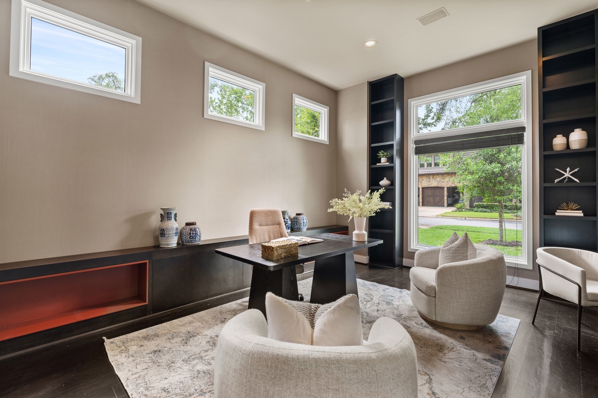 2409 Maconda Lane Houston, TX 77027 - Photo 5 of 40 a work room with furniture and a floor to ceiling window