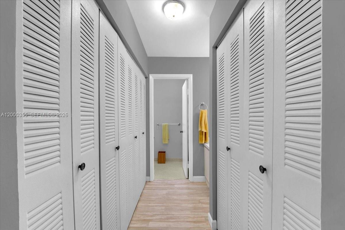 9009 Southwest 138th Street, Unit 202 Miami, FL 33176 - Photo 15 of 23 a view of a hallway with a elevator
