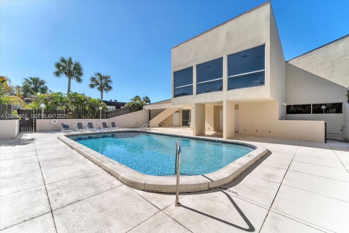 9009 Southwest 138th Street, Unit 202 Miami, FL 33176 - Photo 20 of 23 a view of outdoor space and seating area