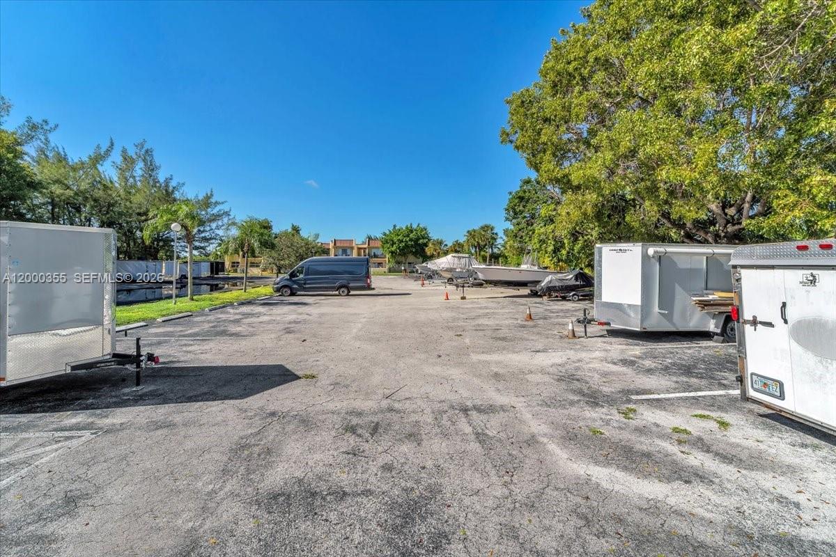 9009 Southwest 138th Street, Unit 202 Miami, FL 33176 - Photo 23 of 23 a view of a outdoor space with a street