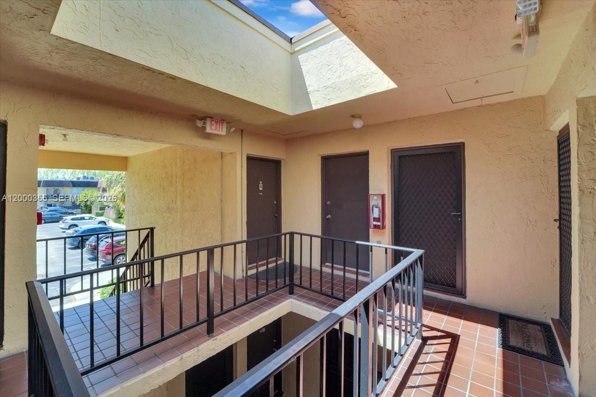9009 Southwest 138th Street, Unit 202 Miami, FL 33176 - Photo 4 of 23 a view of entryway