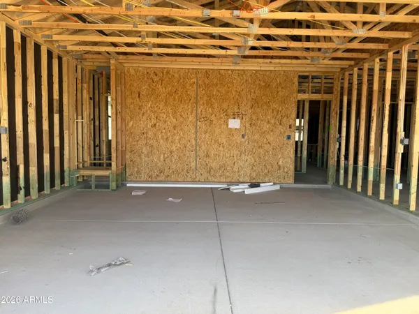 a view of a room with wooden walls