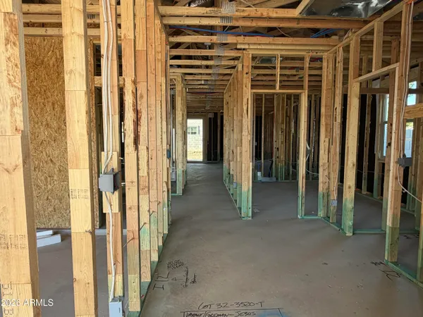 a view of a room with large windows