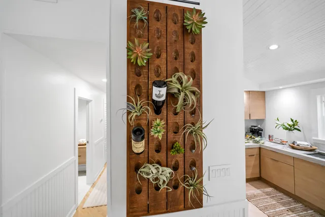 a bathroom with a tub and shower curtain