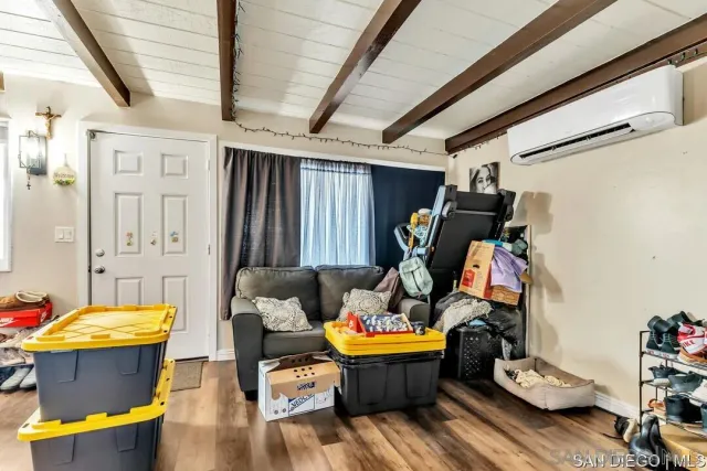 a room with furniture and gym equipment