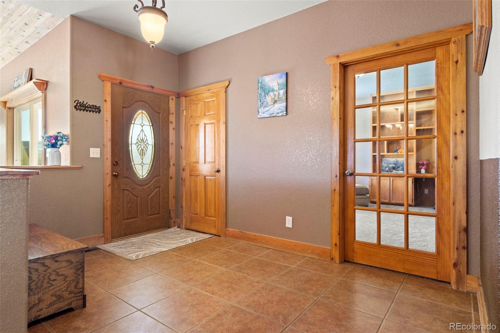 412 Evergreen Road Black Hawk, CO 80422 - Photo 6 of 48 an empty room with windows cabinet and mirror