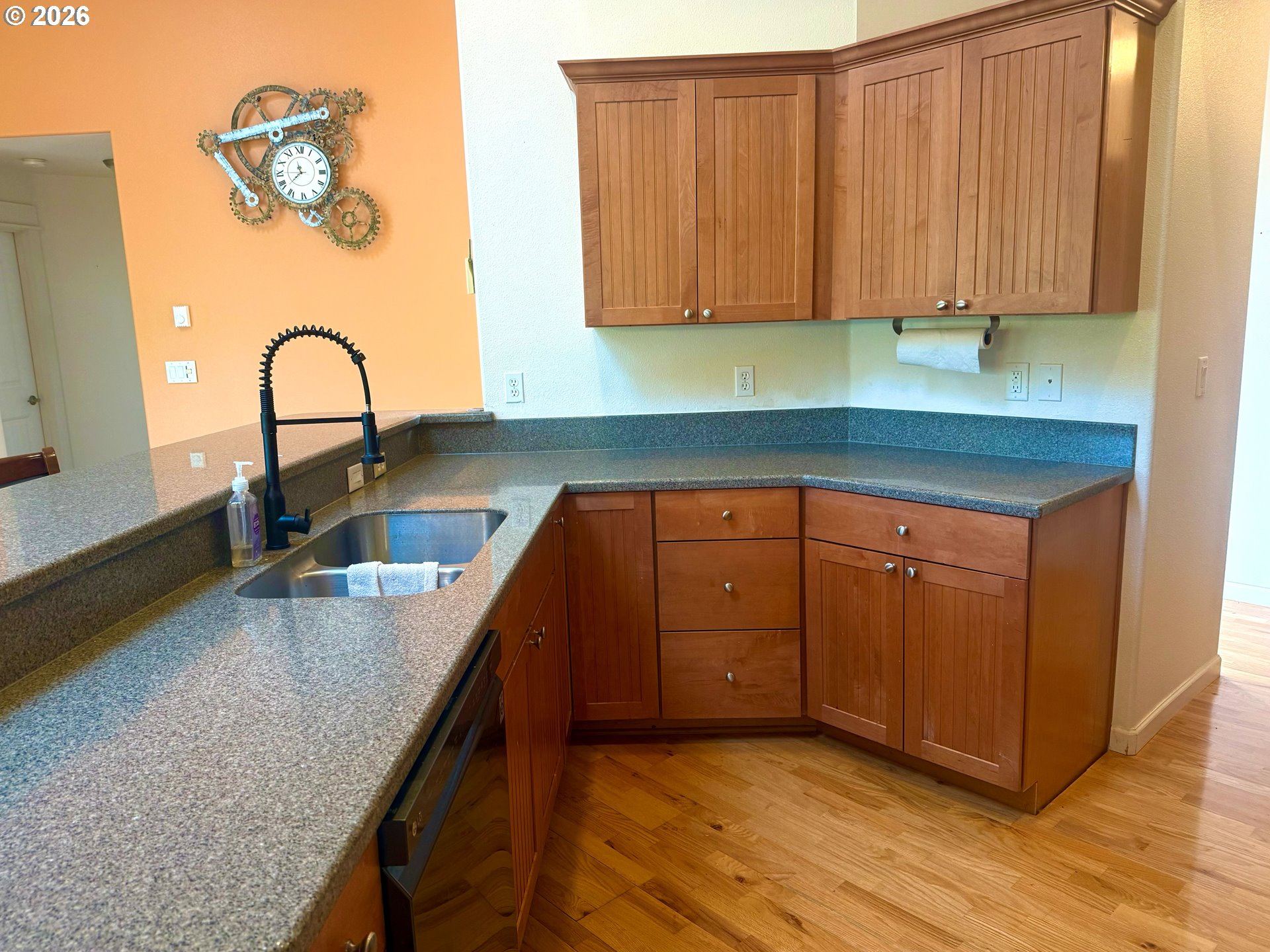 4797 Cloudcroft Lane Florence, OR 97439 - Photo 15 of 33 a kitchen with granite countertop a sink and a stove top oven