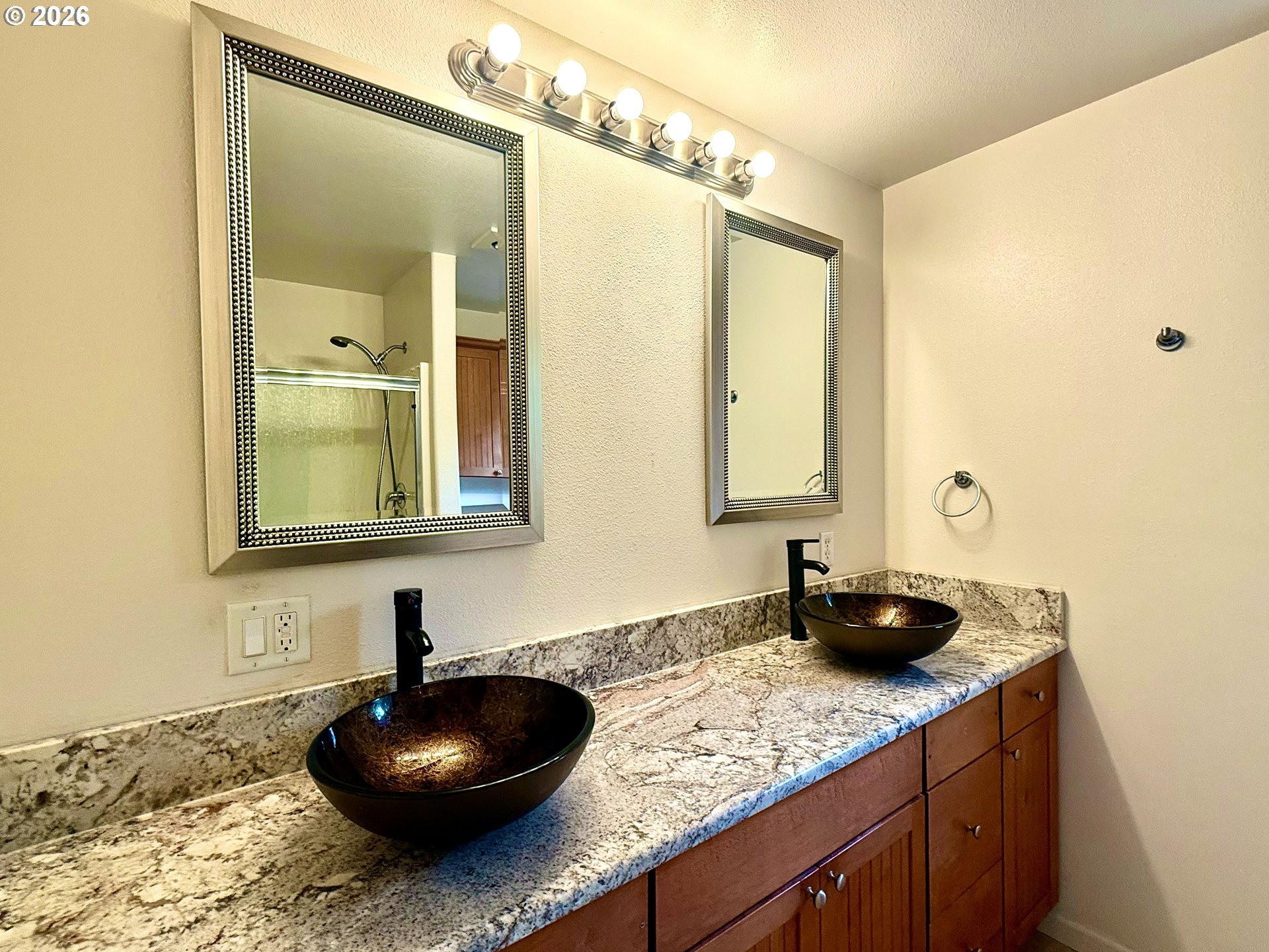 4797 Cloudcroft Lane Florence, OR 97439 - Photo 21 of 33 a bathroom with a granite countertop sink and a mirror