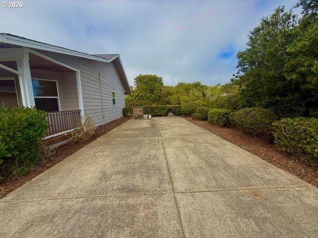 4797 Cloudcroft Lane Florence, OR 97439 - Photo 3 of 33 a view of a backyard of the house
