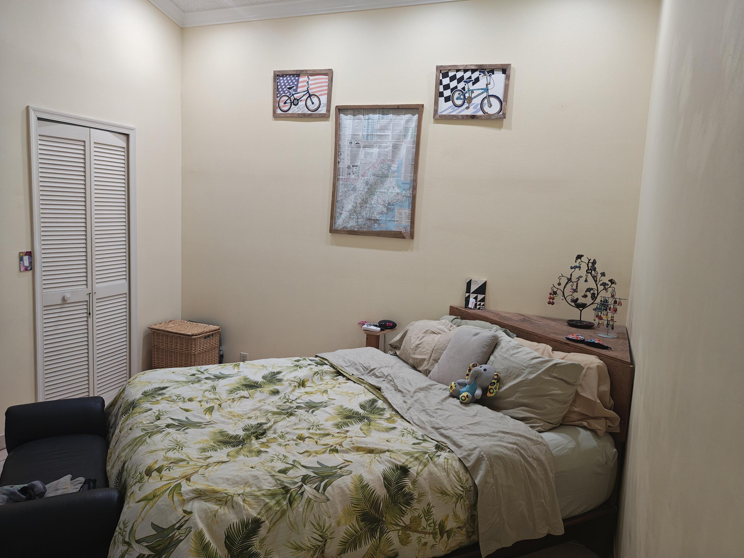 13747 42nd Road North Royal Palm Beach, FL 33411 - Photo 23 of 31 a bedroom with a bed and a window