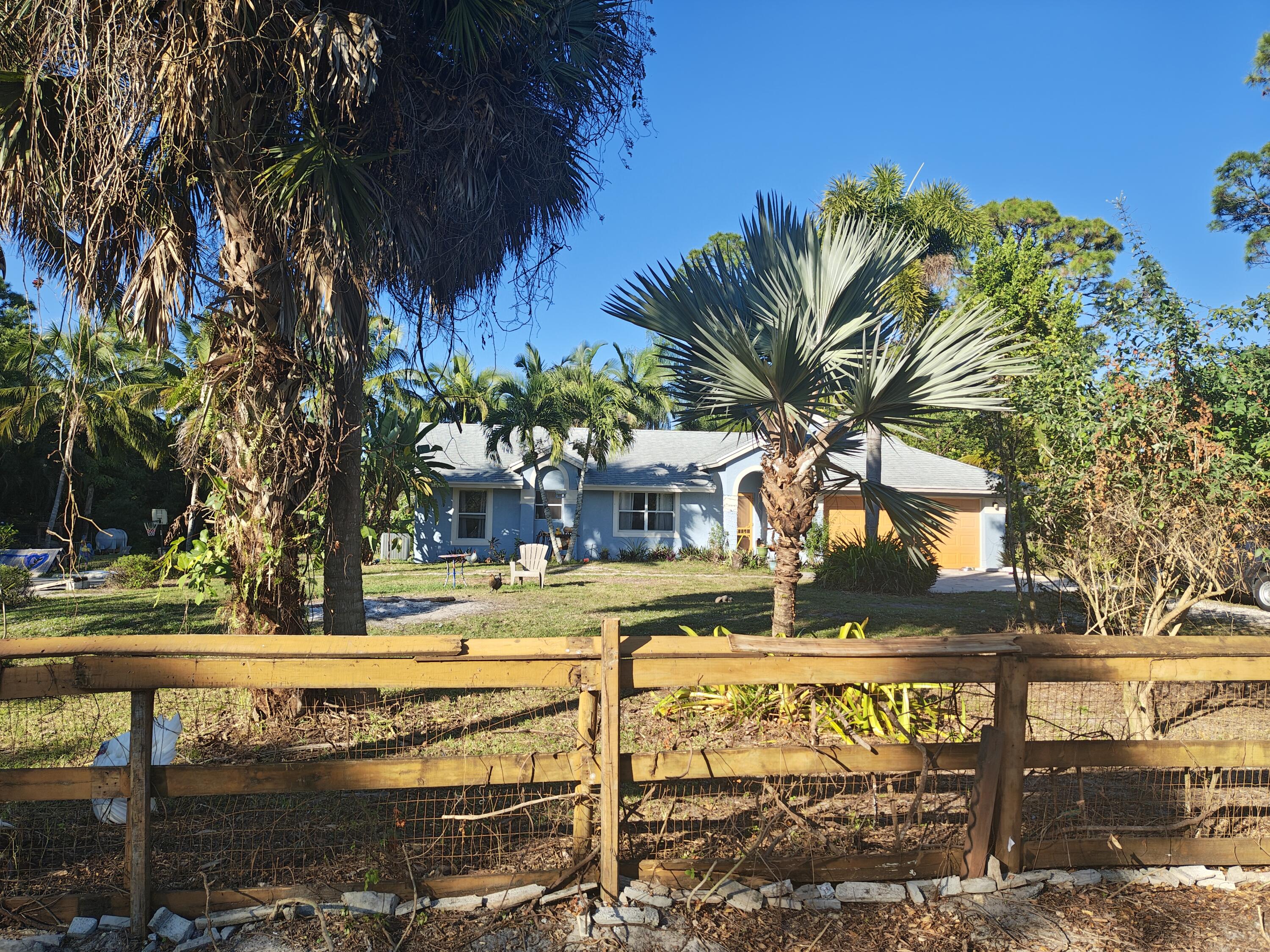 13747 42nd Road North Royal Palm Beach, FL 33411 - Photo 3 of 31 a view of a water fountain