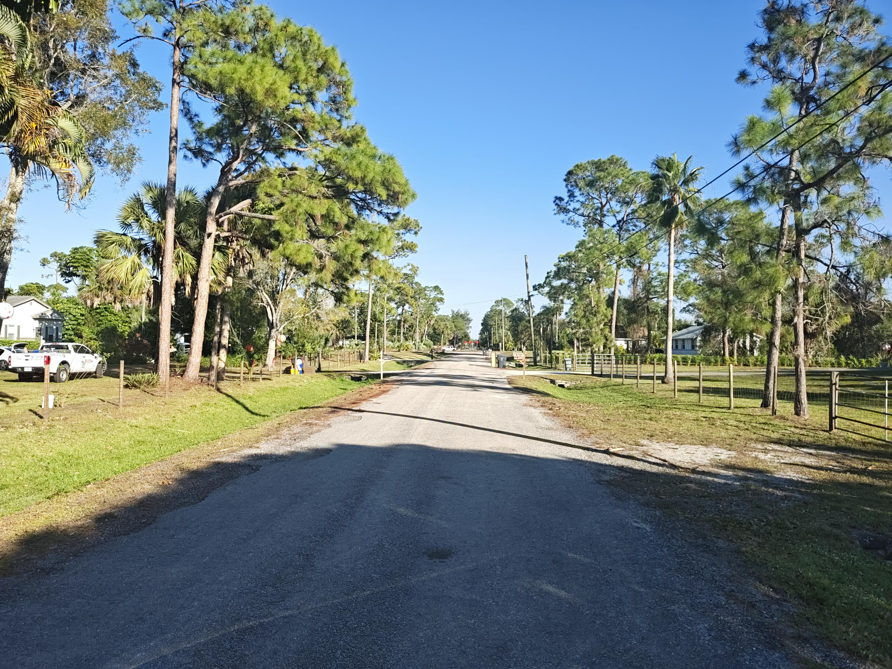 13747 42nd Road North Royal Palm Beach, FL 33411 - Photo 8 of 31 a view of a playground with basketball court