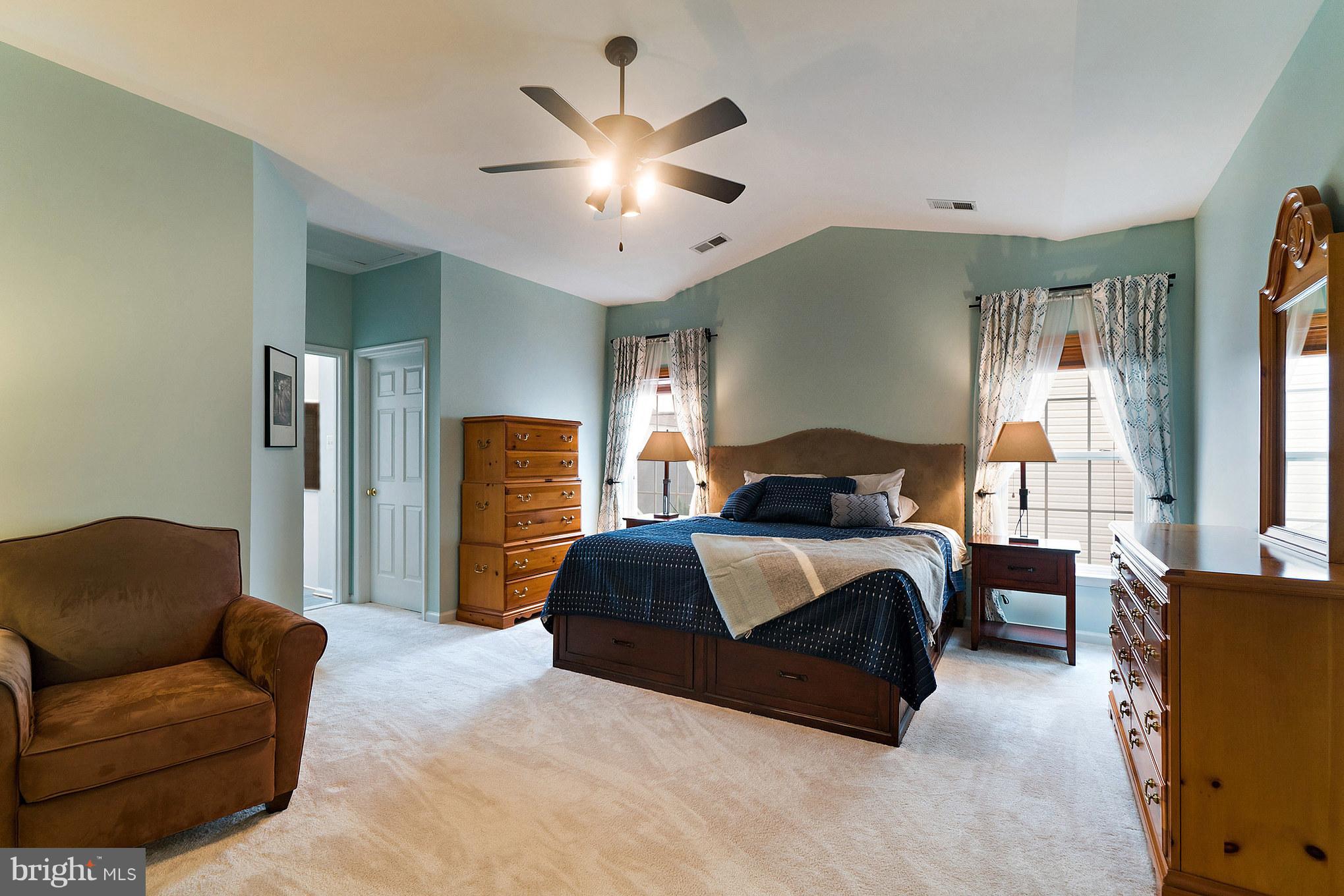 18411 Cornflower Road Boyds, MD 20841 - Photo 17 of 28 a bedroom with a bed couch and window