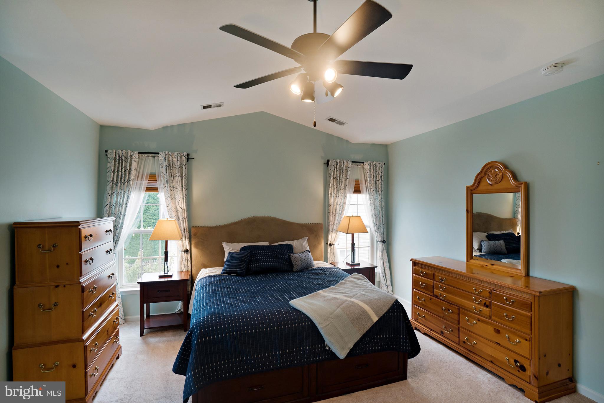 18411 Cornflower Road Boyds, MD 20841 - Photo 18 of 28 a bedroom with a bed and a dresser