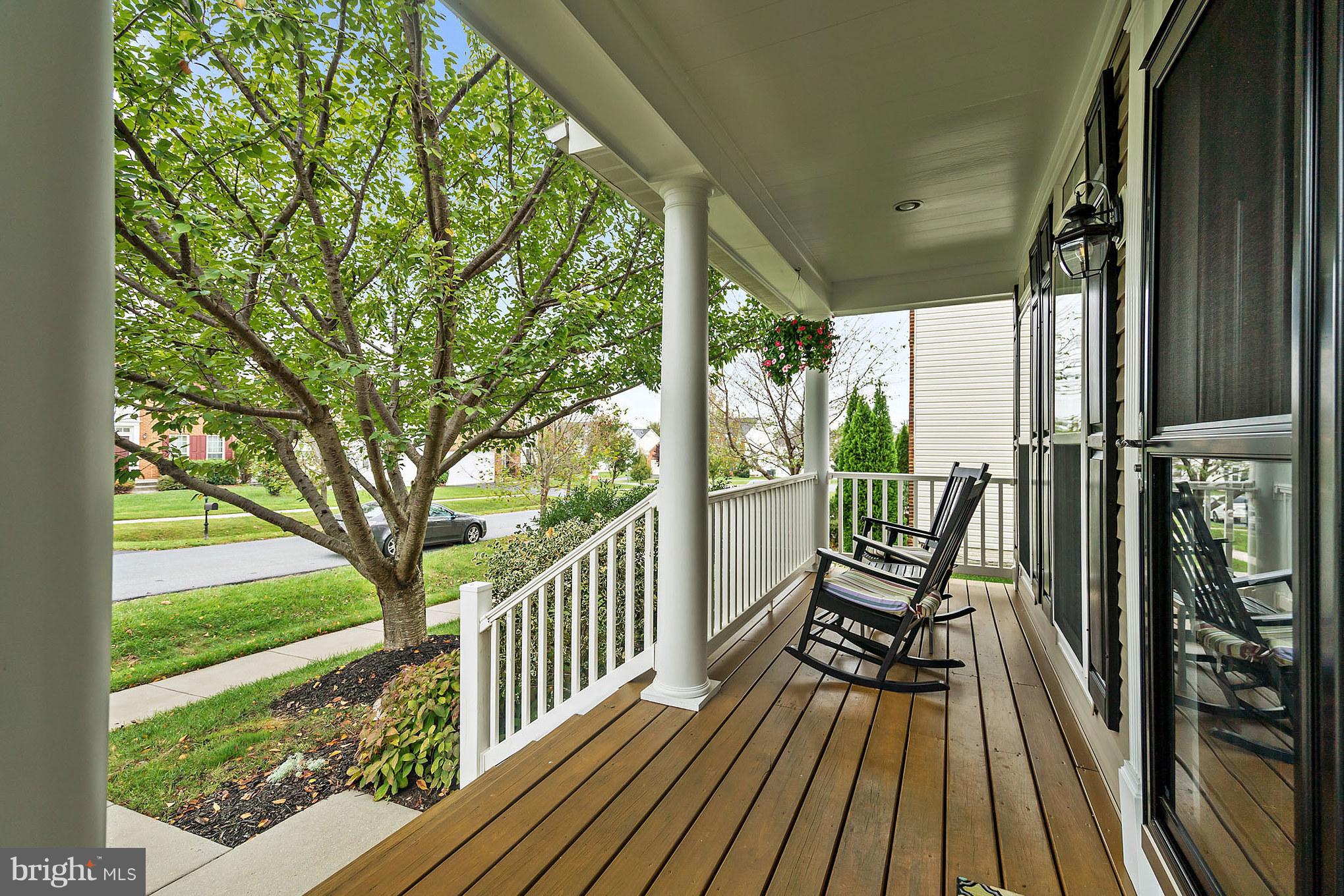 18411 Cornflower Road Boyds, MD 20841 - Photo 2 of 28 a view of balcony with wooden floor and fence