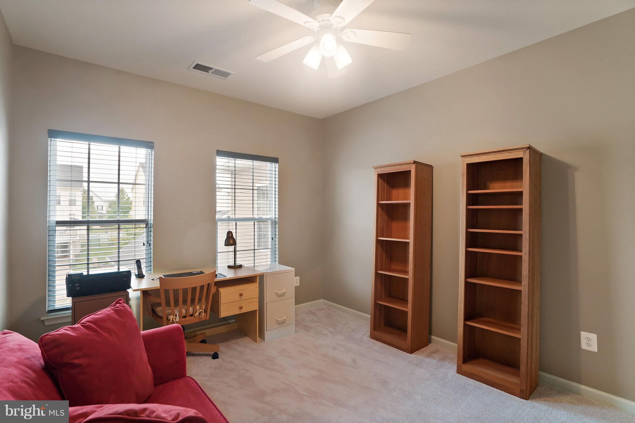 18411 Cornflower Road Boyds, MD 20841 - Photo 21 of 28 a living room with furniture and window
