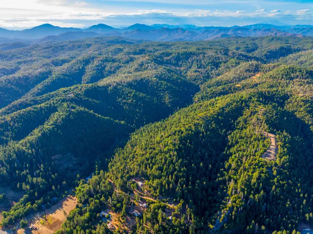 a view of a lake with mountains in the background