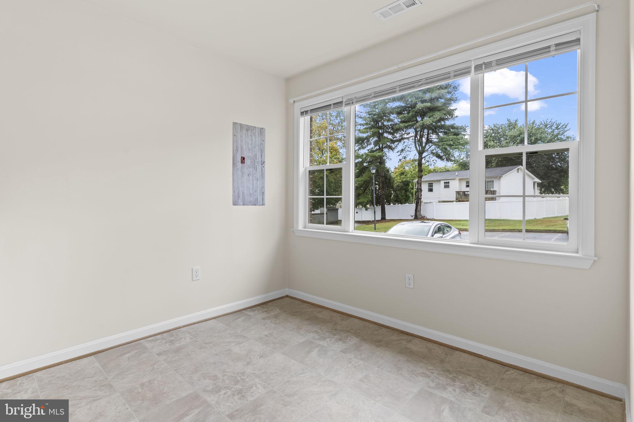 8536 F Street Chesapeake Beach, MD 20732 - Photo 11 of 26 an empty room with a window
