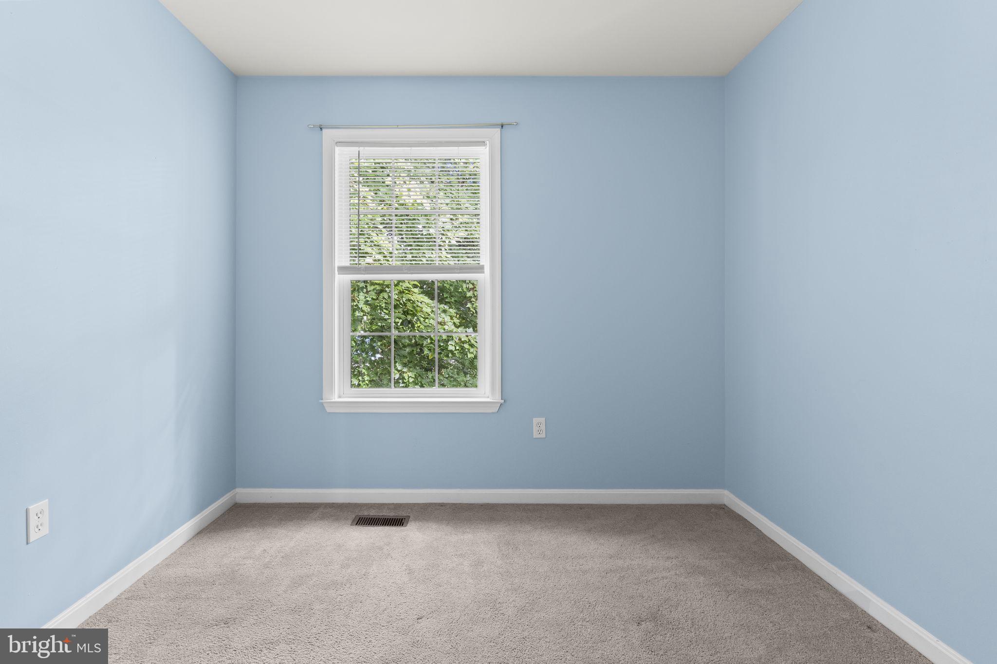 8536 F Street Chesapeake Beach, MD 20732 - Photo 13 of 26 an empty room with a window