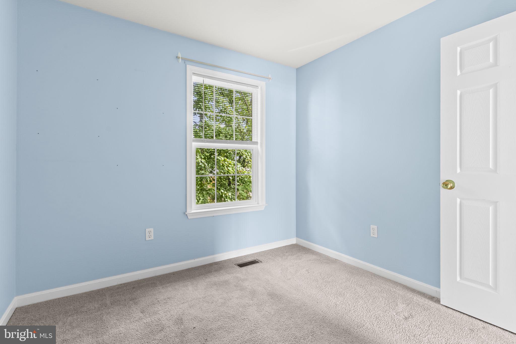 8536 F Street Chesapeake Beach, MD 20732 - Photo 15 of 26 an empty room with a window