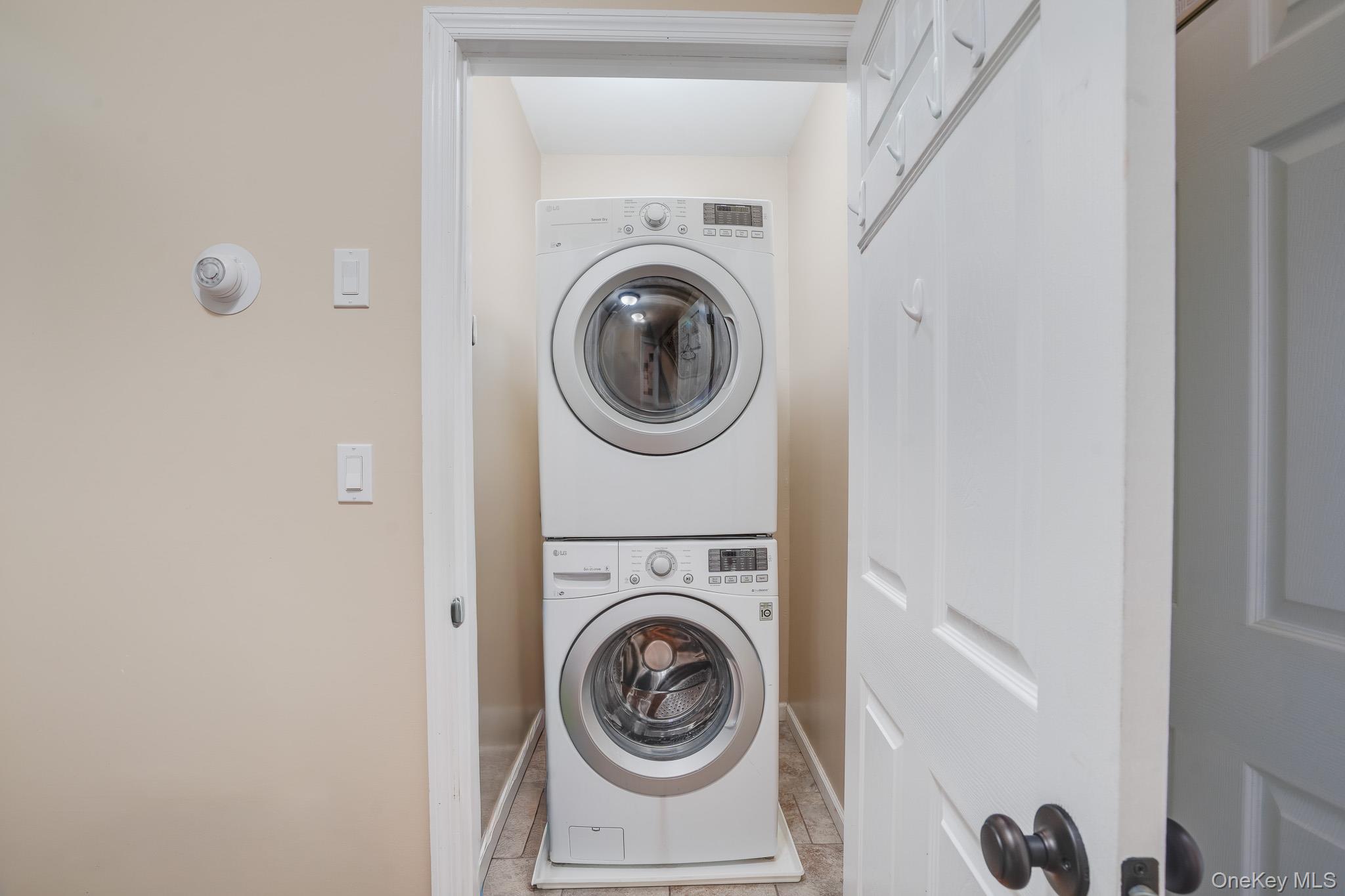 609 Washington Street Peekskill, NY 10566 - Photo 22 of 37 Laundry area with washer and dryer.