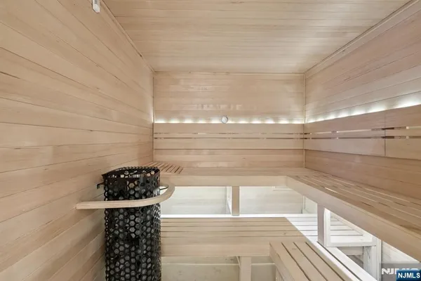 a bathroom with a bathtub and shower