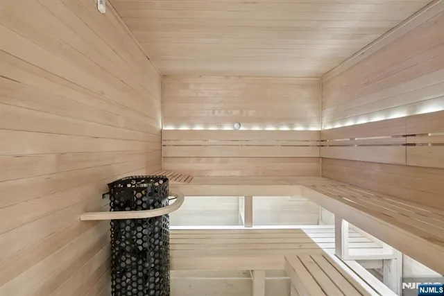 a bathroom with a bathtub and shower