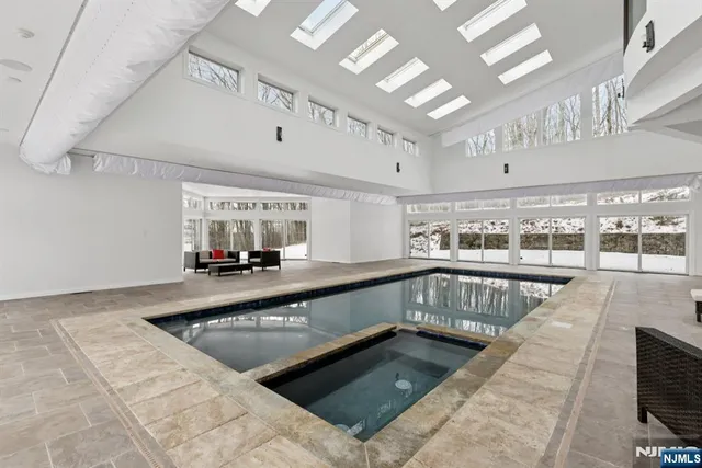 a view of a swimming pool and a balcony