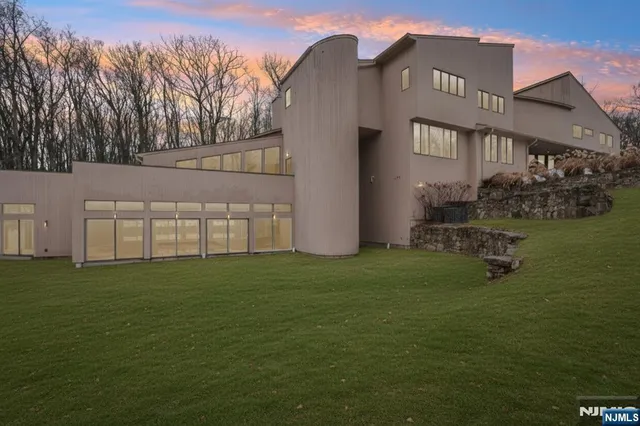 a picture of a bathroom with a sink and a mirror