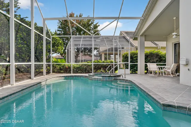 a view of a house with a swimming pool