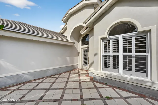 a view of a balcony with door and outdoor space